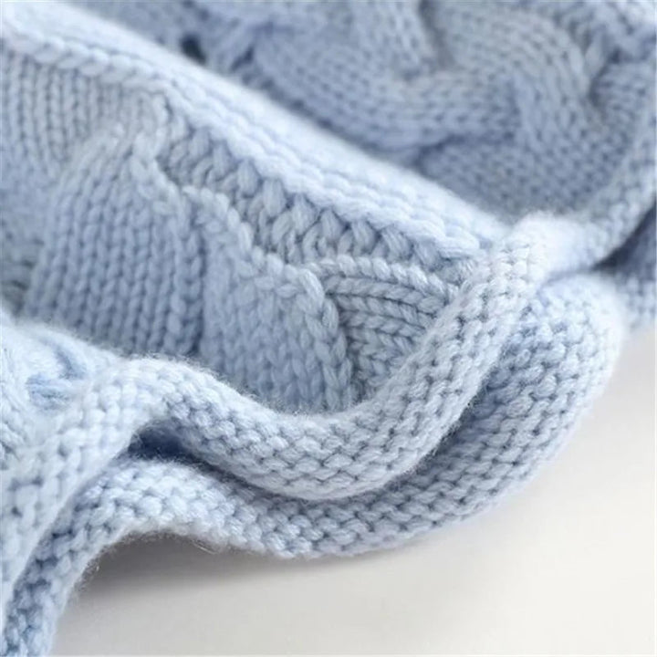 Premium blue cable knit cashmere turtleneck for women, soft and warm.