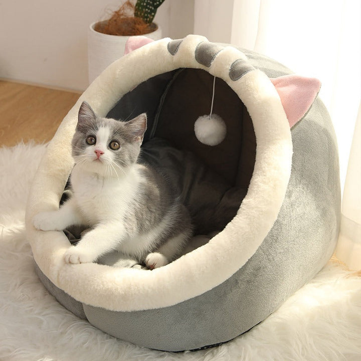 Luxurious grey Feline Cozy Cave Bed for cats. Offers a warm, private pet hideaway, ultimate feline comfort.