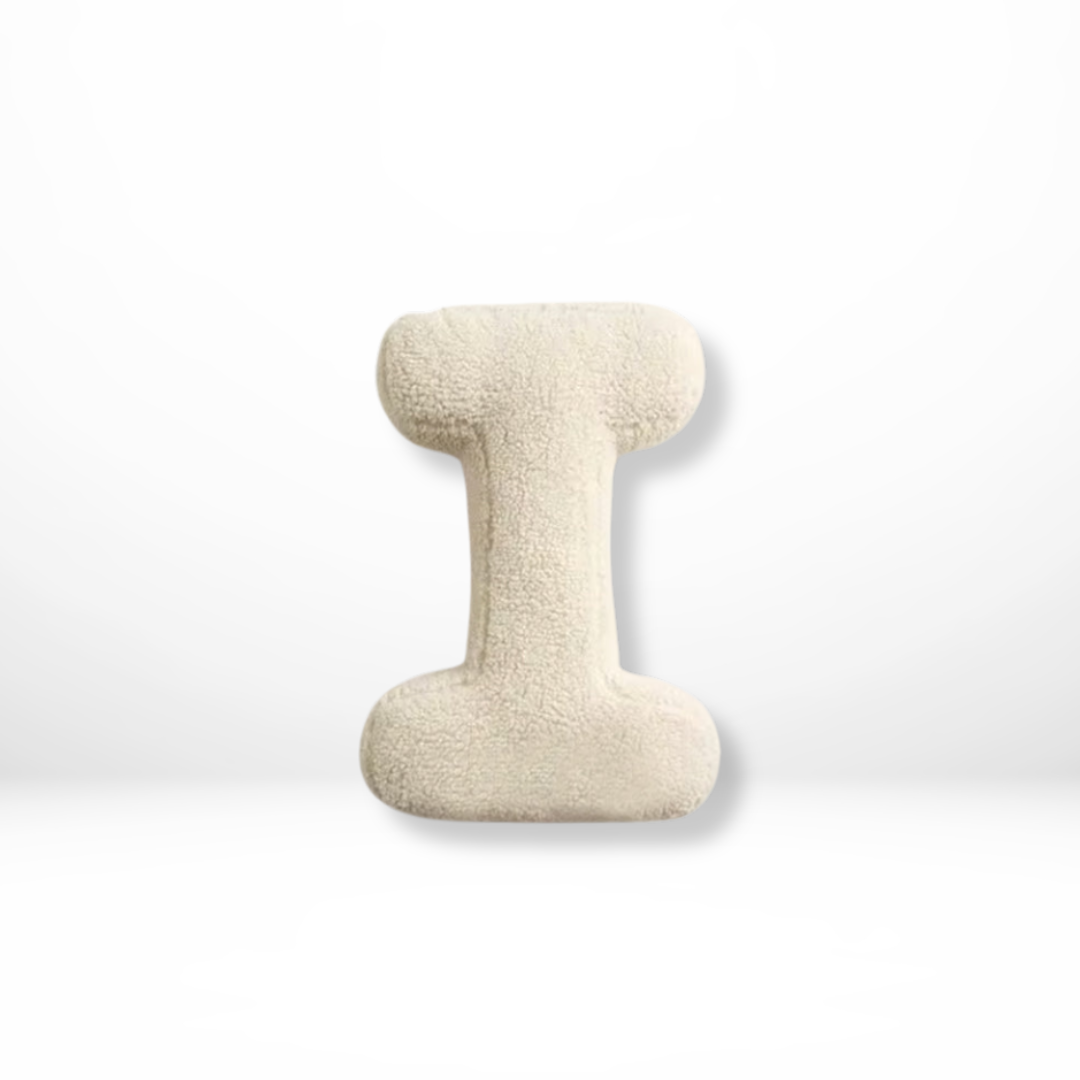 Beautiful velvet initial pillow, a decorative and personalized gift idea.