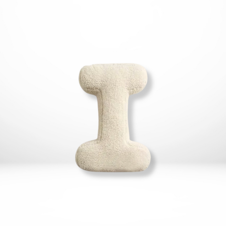 Beautiful velvet initial pillow, a decorative and personalized gift idea.