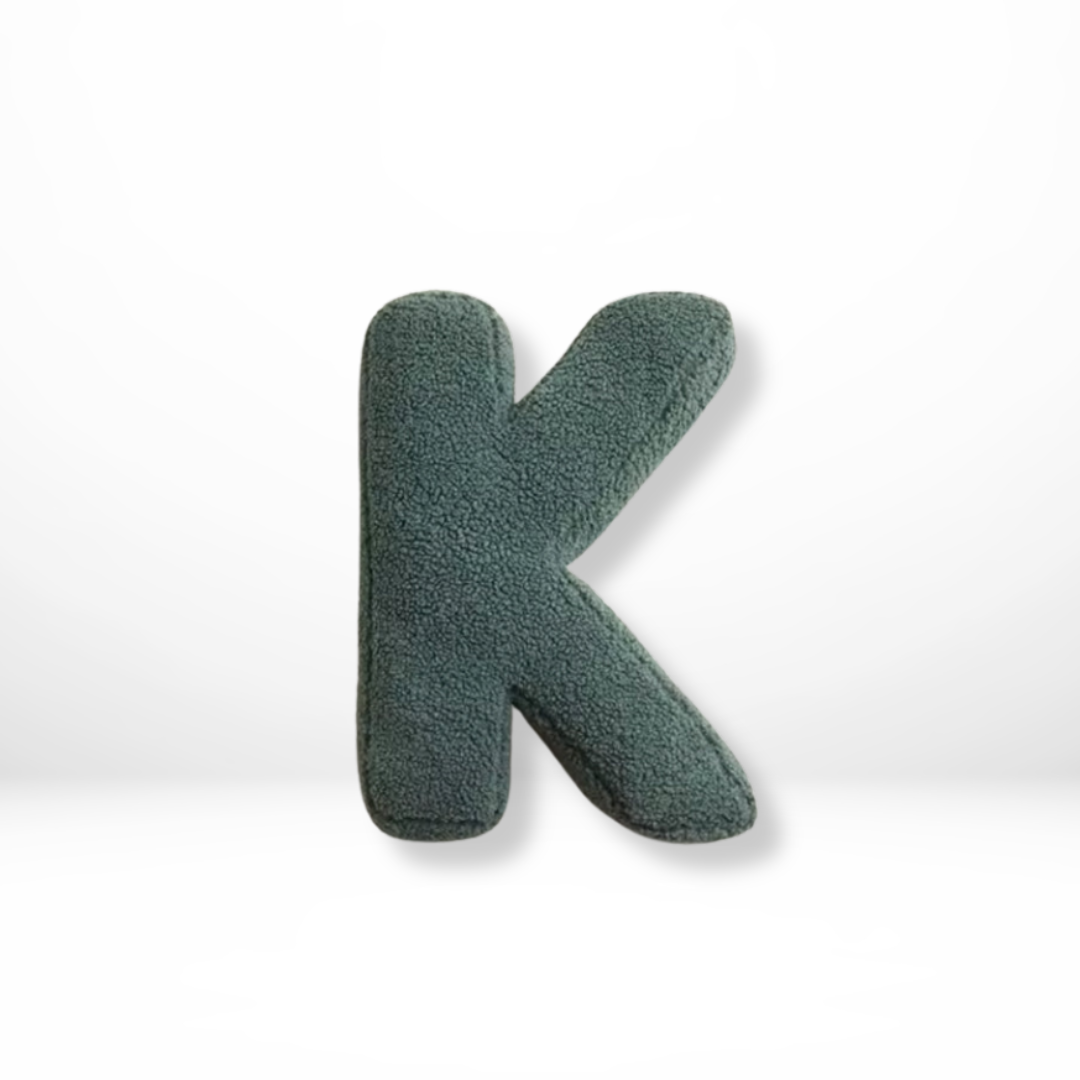 Cozy velvet letter pillow, perfect for creating a warm & inviting home atmosphere.