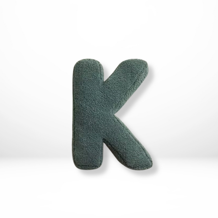 Cozy velvet letter pillow, perfect for creating a warm & inviting home atmosphere.