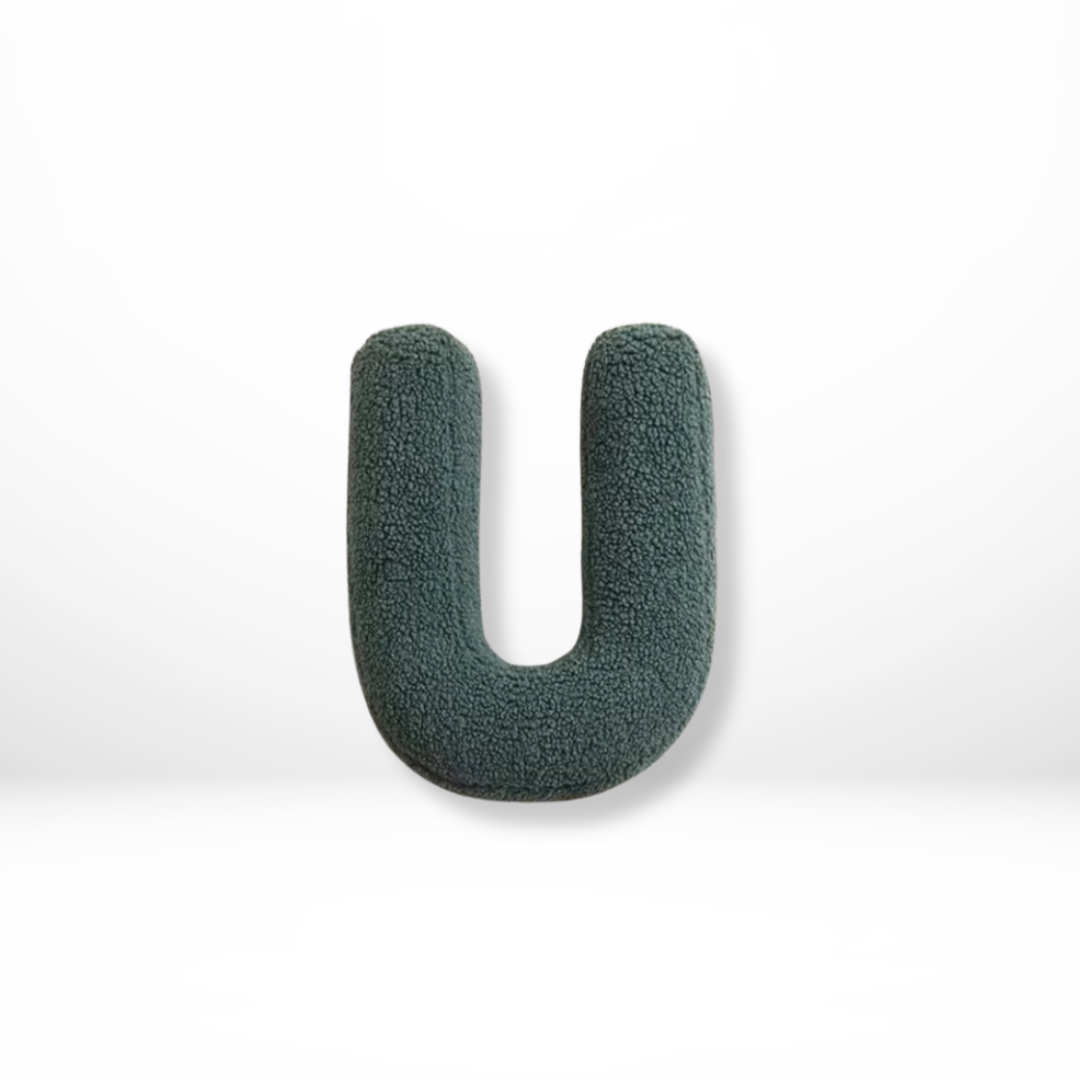 Velvet alphabet decorative pillow, perfect for adding character to home decor.