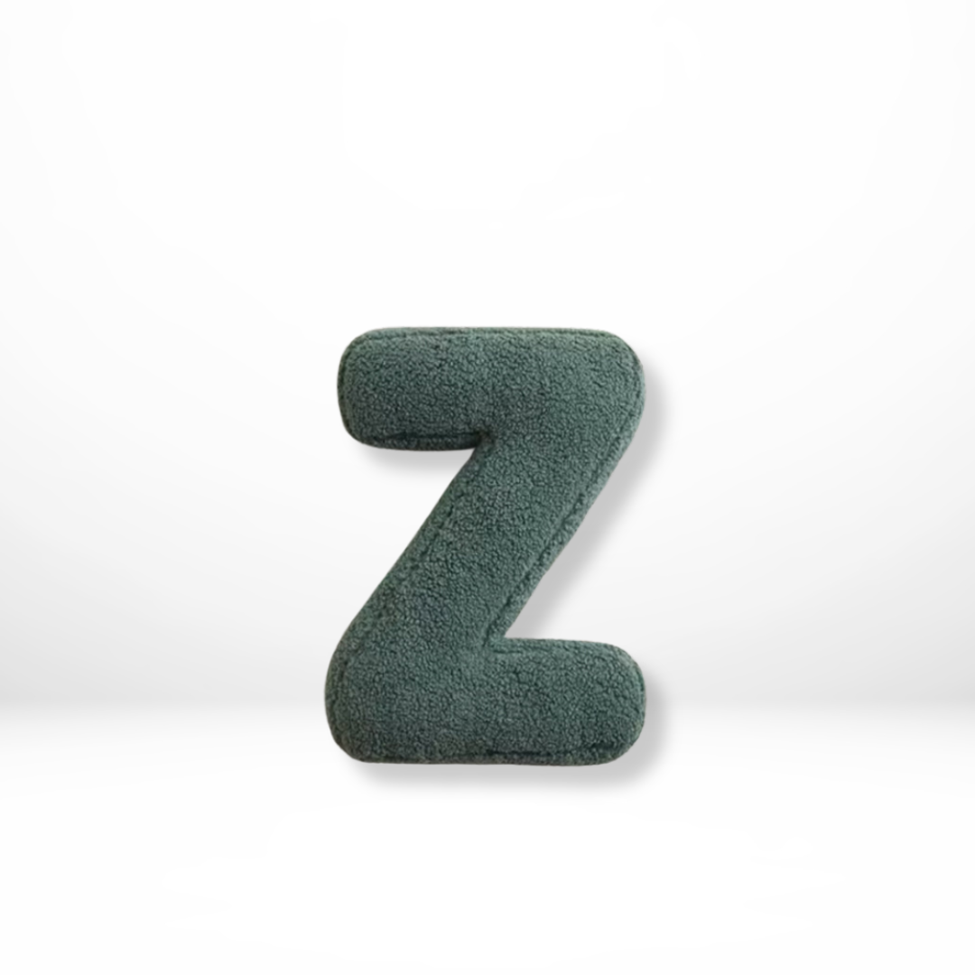 Plush velvet letter throw pillow, combining comfort with personalized home decor.
