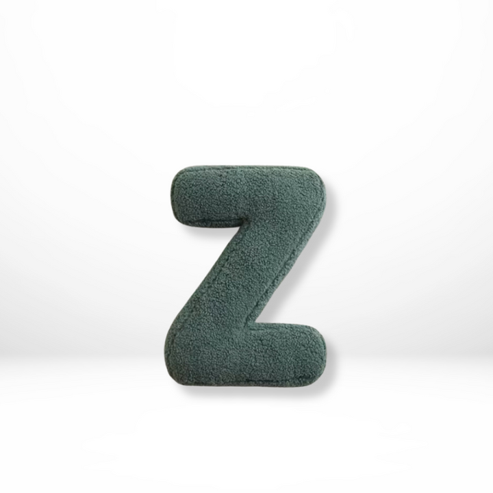 Plush velvet letter throw pillow, combining comfort with personalized home decor.