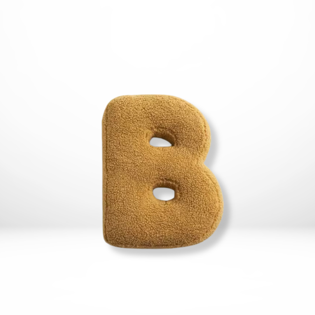 Stylish velvet alphabet pillow, a sophisticated accent for modern home decor.