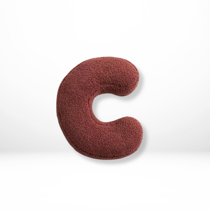 Personalized velvet letter cushion, thoughtful gift for a unique home accent.