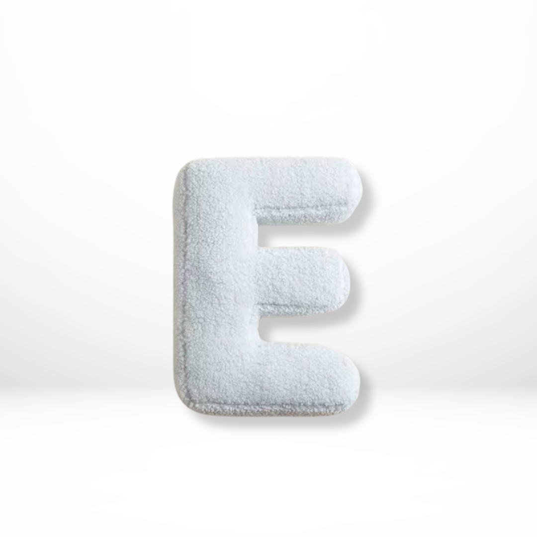 Velvet initial throw pillow, perfect for adding a soft, stylish touch to sofas.