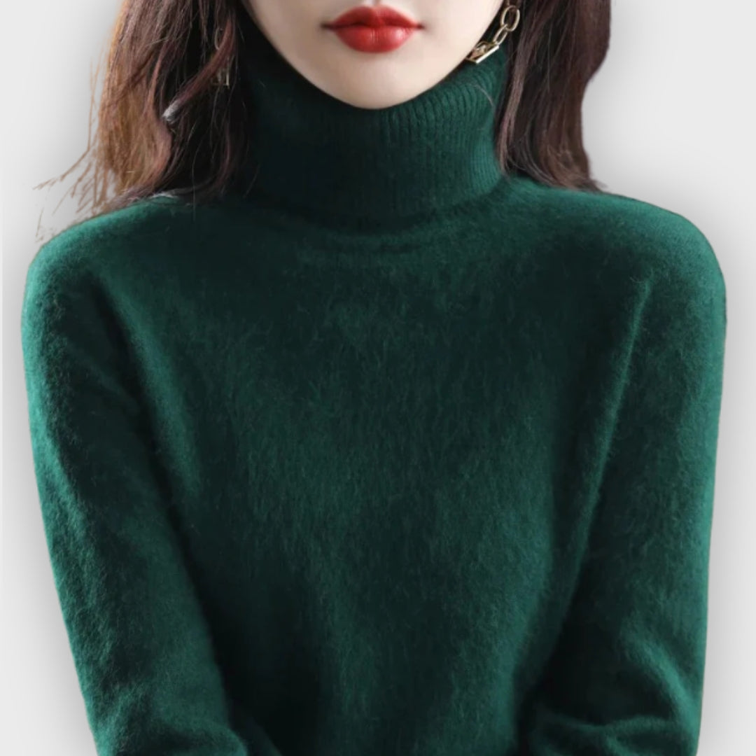 Sophisticated women's turtleneck sweater for winter. Premium, cozy knitwear with long sleeves.