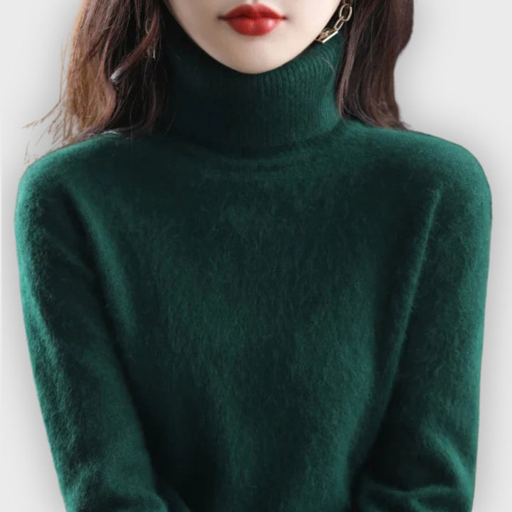 Sophisticated women's turtleneck sweater for winter. Premium, cozy knitwear with long sleeves.