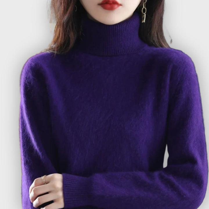 Luxurious women's long-sleeve knitwear, a cozy roll neck sweater for ultimate winter warmth.