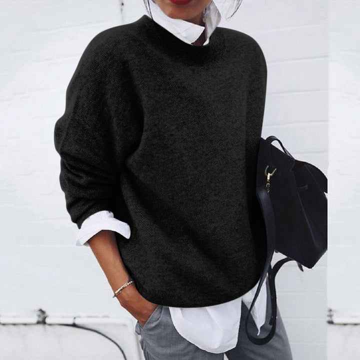 Stylish women's modern knit sweater. Versatile long sleeve pullover for effortless fall & winter fashion.