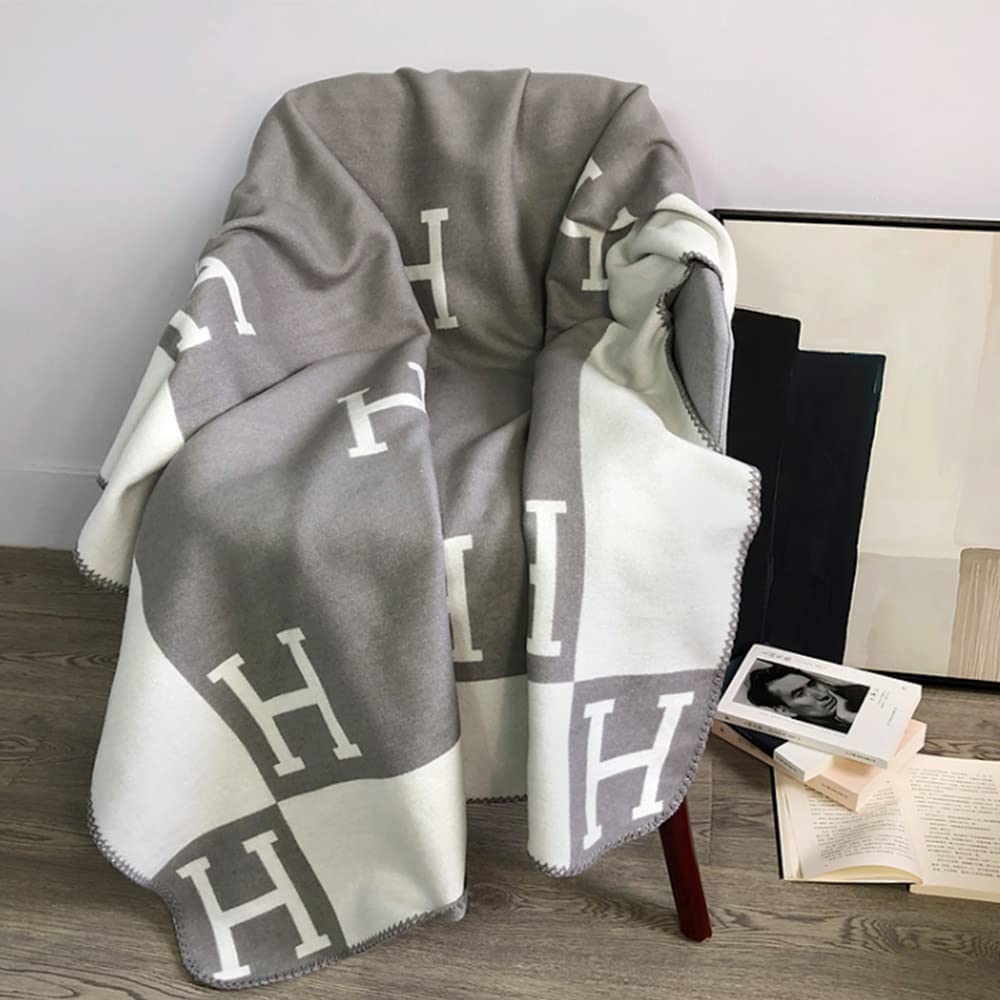 Premium quality 140x170 cm wool cashmere throw blanket, ultra-soft and warm for cozy homes.