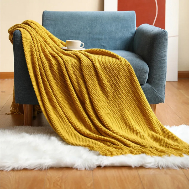Luxury Merino-Style throw blanket, soft & cozy with elegant tassels for ultimate home comfort.