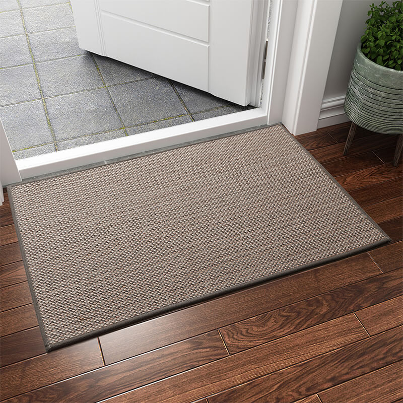 Protect your floors with this durable, machine washable woven indoor door mat. An essential floor protector.
