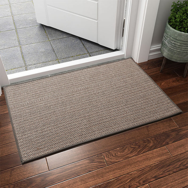 Protect your floors with this durable, machine washable woven indoor door mat. An essential floor protector.