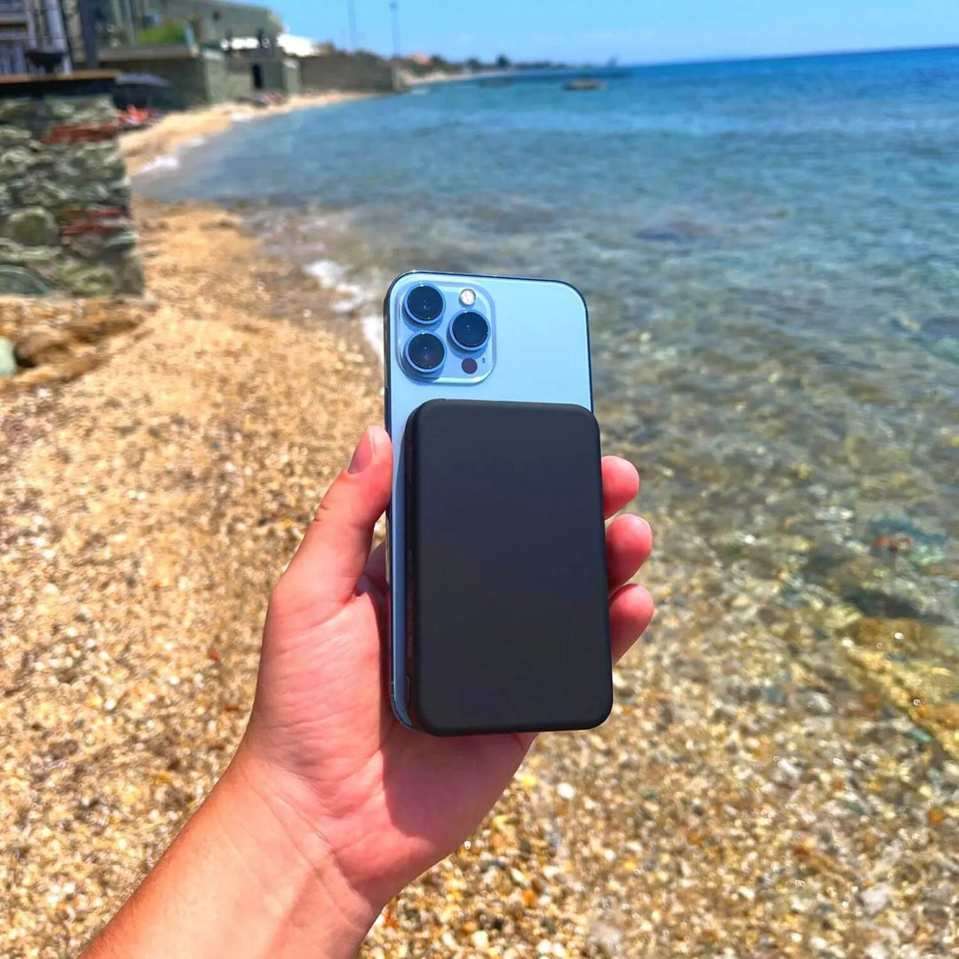 Magnetic snap-on MagSafe power bank, a wireless portable charger for iPhone.