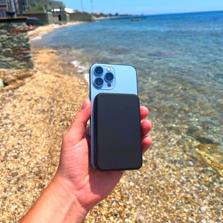 Magnetic snap-on MagSafe power bank, a wireless portable charger for iPhone.