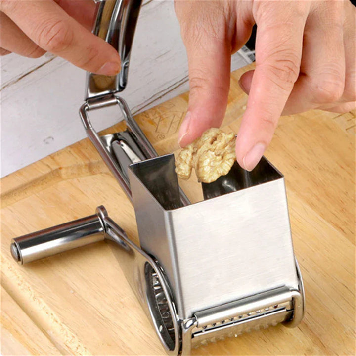 Ergonomic manual cheese grater, stainless steel, designed for comfortable, efficient grating in any home kitchen.