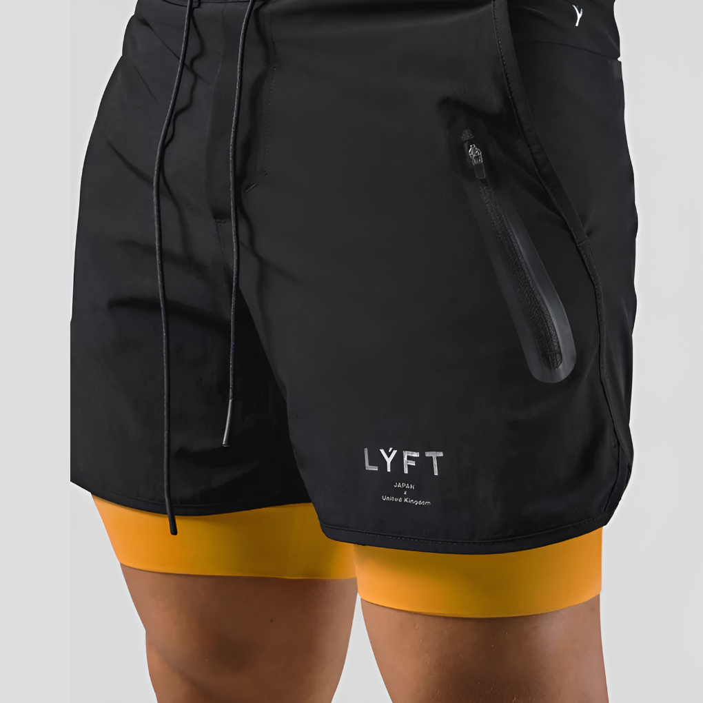 Men's 2-in-1 training shorts with built-in compression. Ideal for gym, running, and athletic performance workout.