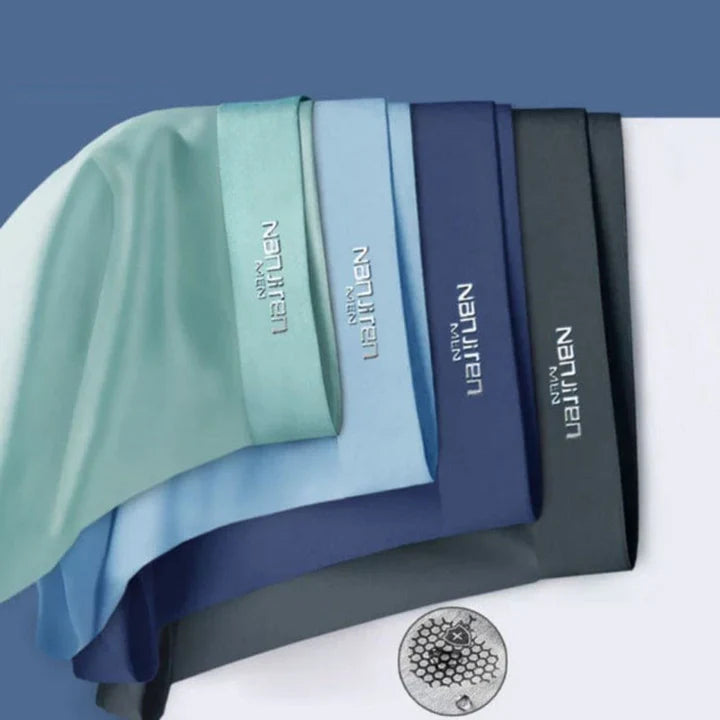 Four pairs of men's comfort fit boxer briefs, neatly folded, showing elastic waistbands