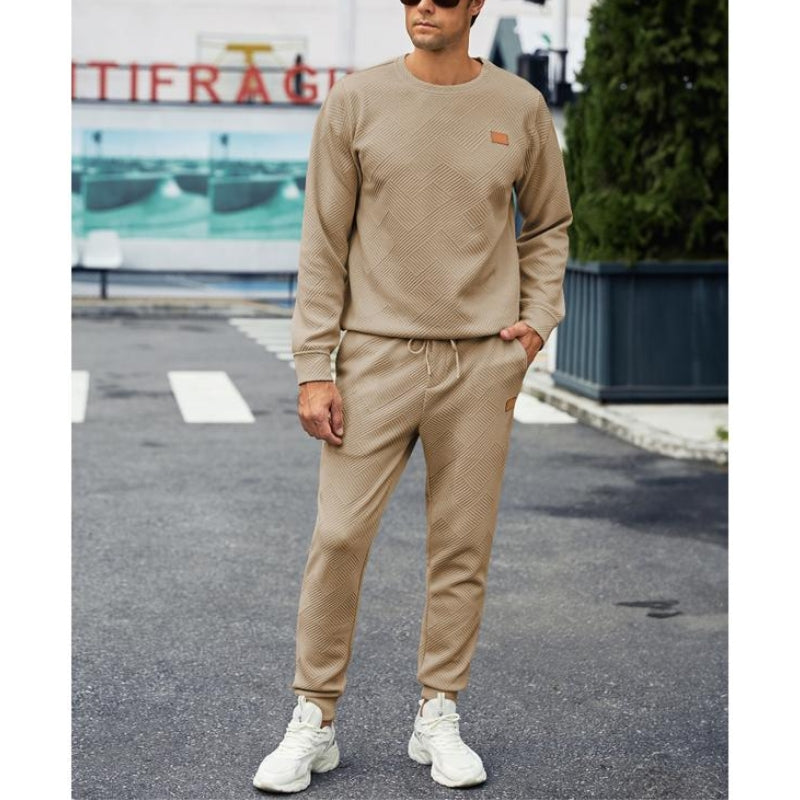 Sporty men's active tracksuit with a matching sweatshirt and joggers, great for workouts or outdoor activities.