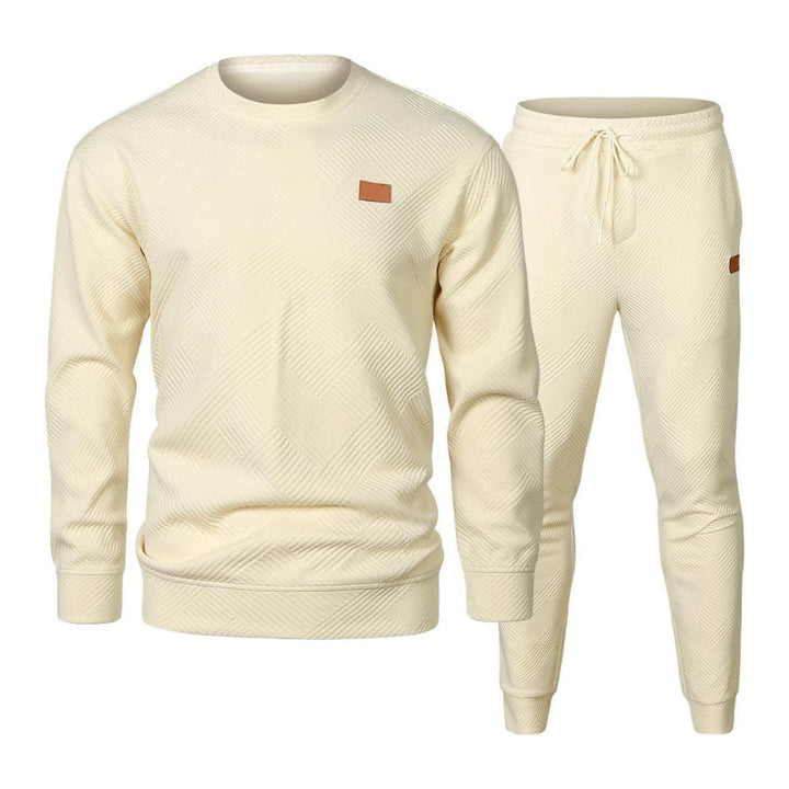 Men's casual tracksuit set featuring a comfortable sweatshirt and joggers with an adjustable drawstring waist.