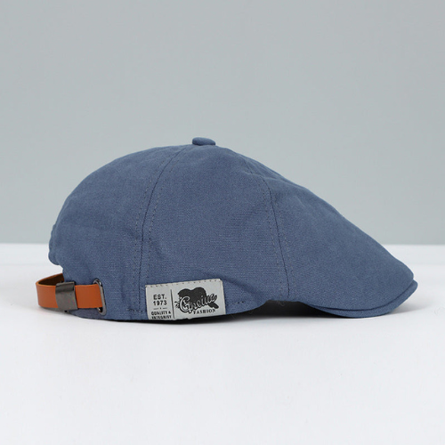Close-up of elegant men's beret fabric texture, adjustable headwear for classic style