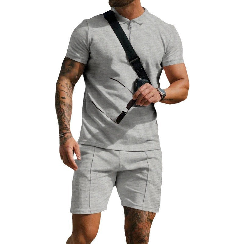 Versatile men's athletic outfit, short sleeve top and shorts, suitable for training or casual activewear.