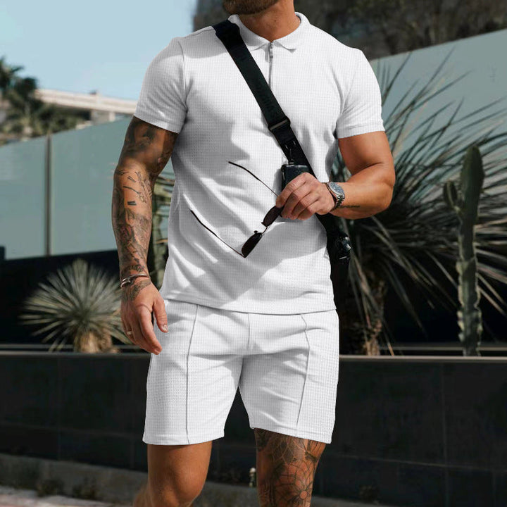 Breathable men's sports set, short sleeve tee & shorts, ensuring comfort during intense workouts.