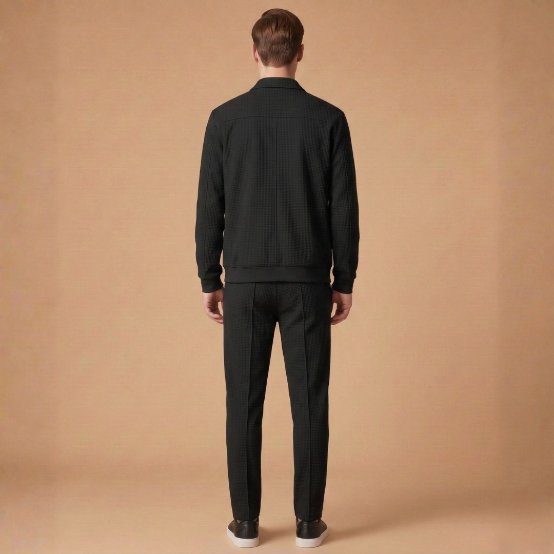 Modern men's athletic tracksuit set, combining a sleek zip jacket with straight pants for active and casual style.