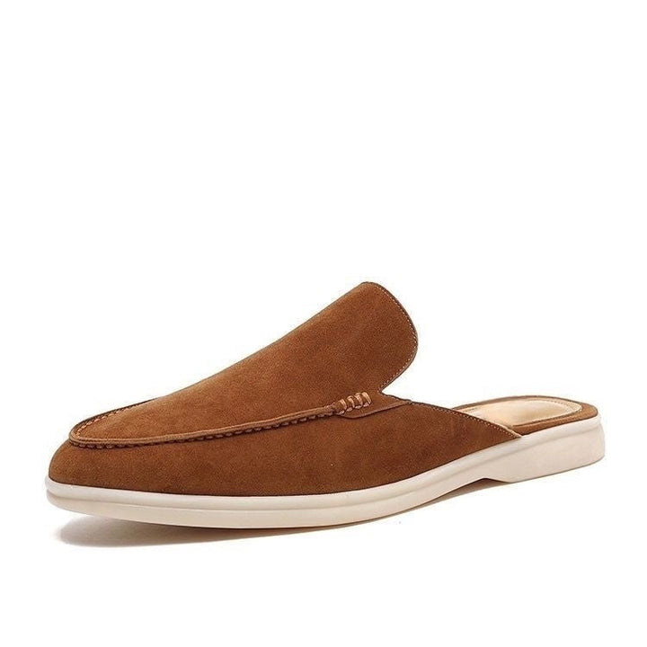 Comfortable men's backless slip-on loafers, essential summer shoes for a relaxed, modern casual look.