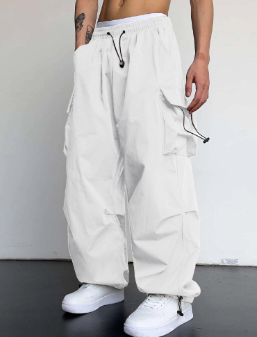 Relaxed fit men's baggy cargo pants featuring a wide leg, offering maximum comfort and a stylish, loose silhouette.