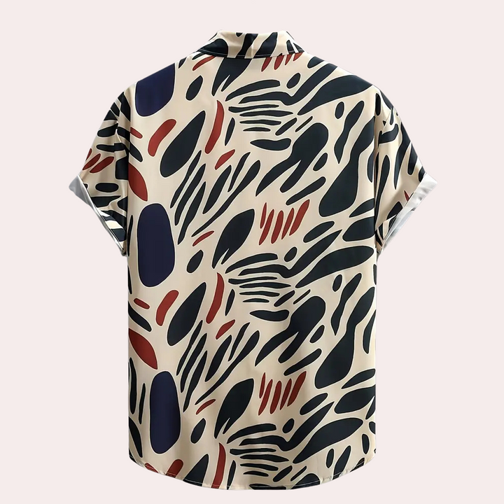 Beige men's printed short sleeve shirt with an abstract design, a comfortable choice for modern men's summer outfits.