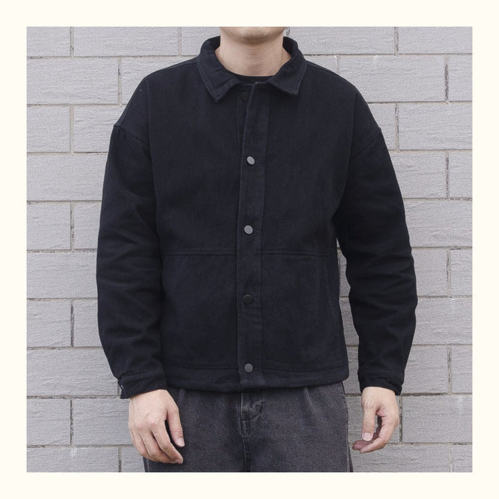 Lightweight men's spring/fall button-down jacket, relaxed fit for comfortable daily wear.