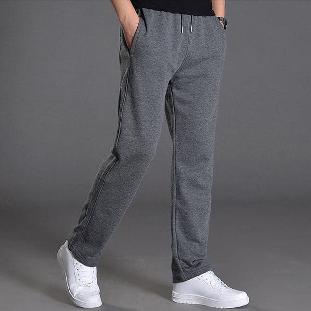 Grey men's relaxed fit trousers, perfect for spring fashion and everyday casual comfort.
