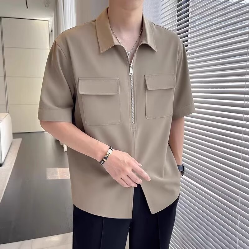 White men's zip-up short sleeve casual shirt, relaxed fit & collared. Effortless style for summer comfort.