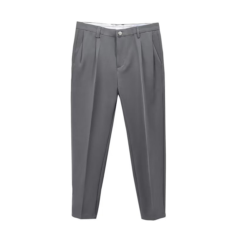 Chic light grey high-waisted pleated cropped pants for men, blending dressy with contemporary flair.