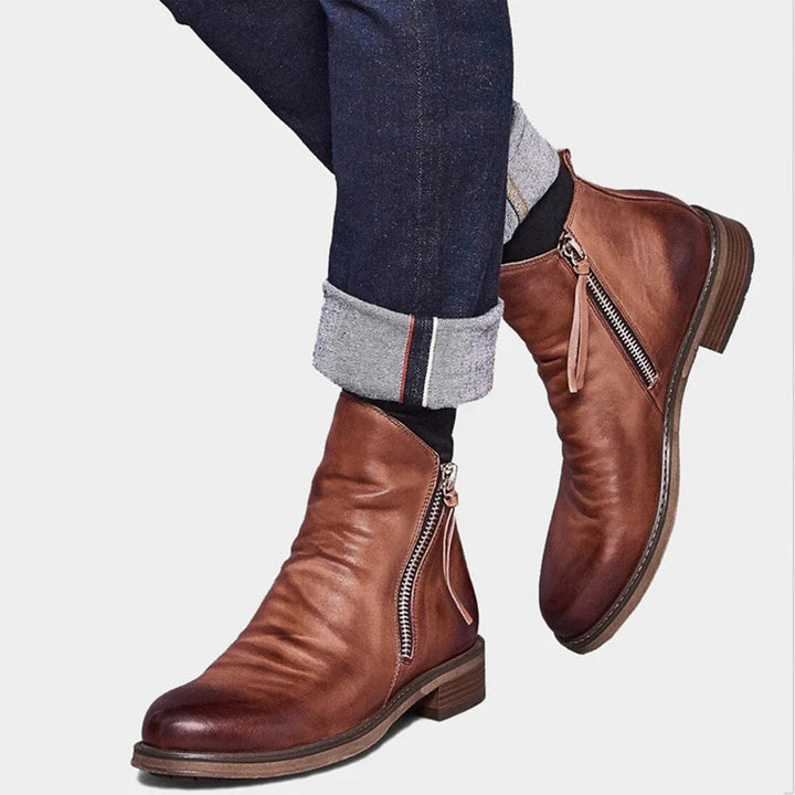 Stylish men's ankle boots made from genuine leather, featuring a practical side zipper.
