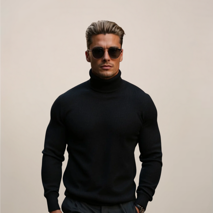 Men's black long sleeve turtleneck pullover sweater in a spring knit, styled casually.