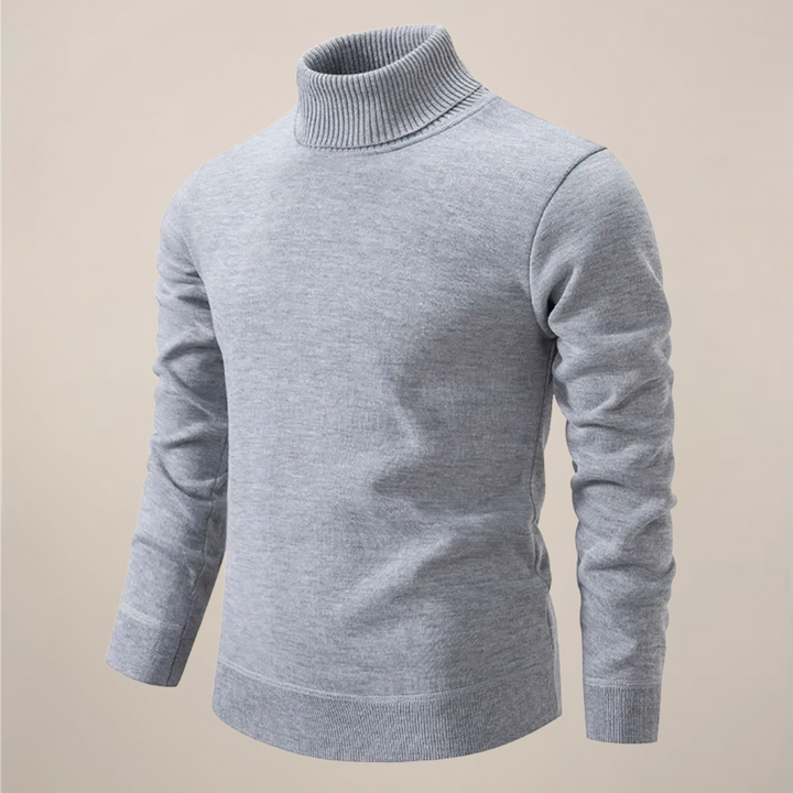 Stylish men's blue turtleneck pullover sweater, a comfortable and versatile spring knitwear piece.