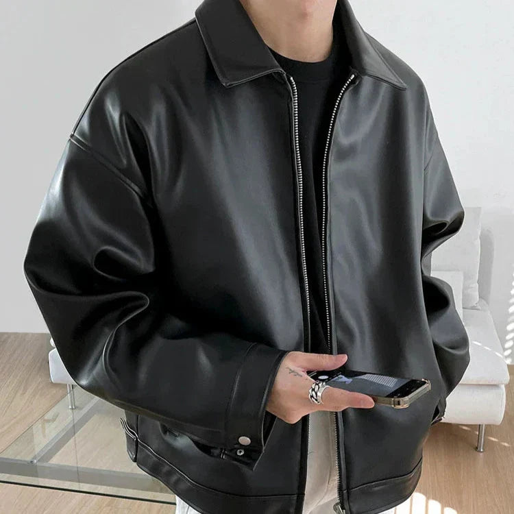 Streetwear men's oversized black leather bomber jacket, front view, fashion outerwear