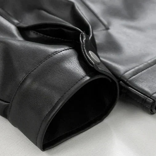 Oversized black leather bomber jacket for men, a key piece of streetwear outerwear