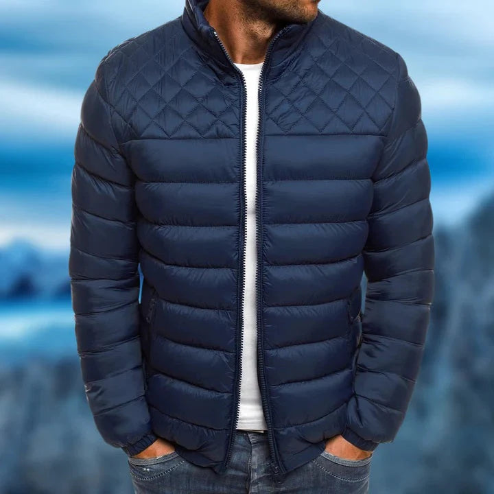 Durable men's quilted puffer jacket, designed for warmth & protection against winter elements. Essential outerwear.