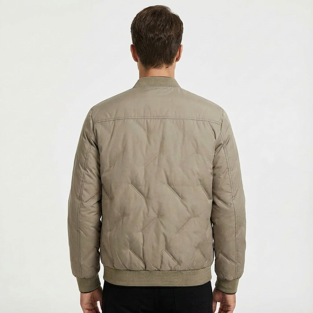 Khaki men's lightweight quilted bomber jacket. Casual zip-front outerwear for fall/spring fashion.