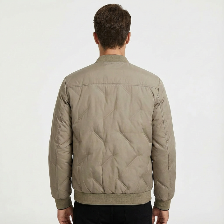 Khaki men's lightweight quilted bomber jacket. Casual zip-front outerwear for fall/spring fashion.