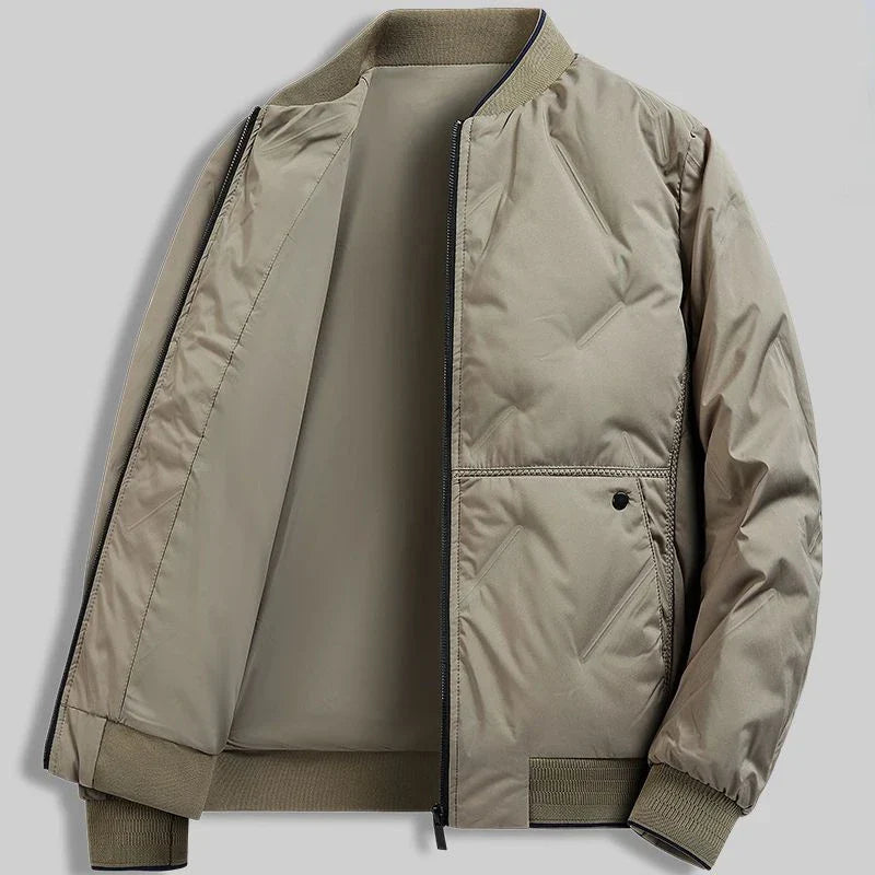 Stylish blue men's quilted bomber jacket. Everyday casual outerwear, ideal for fall/spring fashion.