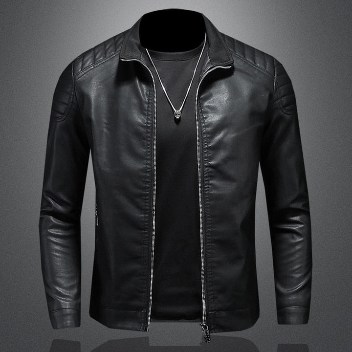 Black slim-fit men's biker jacket. Features quilted shoulder details & a sleek stand collar. Men's fashion.
