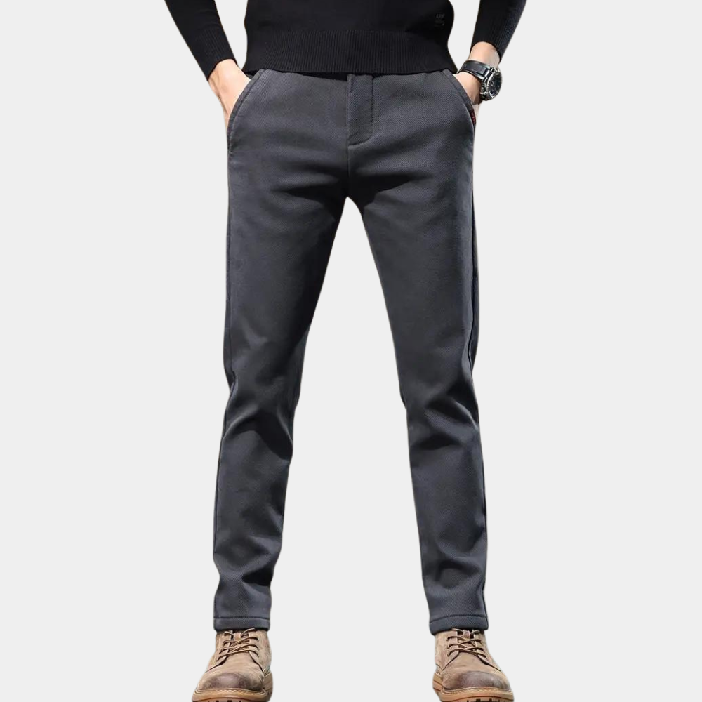 Comfortable men's taupe tapered stretch pants with a modern slim fit, great for versatile everyday wear.