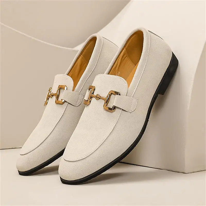 Breathable men's summer slip-on loafers with elegant metal detail, providing comfortable smart casual style.
